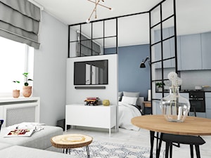 Projekt mieszkania na mokotowie - Mały biały niebieski salon z kuchnią z jadalnią, styl skandynawski - zdjęcie od Anna M. Pawłowicz Architektura Wnętrz