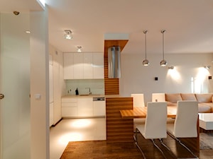 Mieszkanie z nutą Skandynawską - Średnia otwarta z salonem z zabudowaną lodówką kuchnia w kształcie litery u z wyspą lub półwyspem, styl skandynawski - zdjęcie od ARCHITETTO