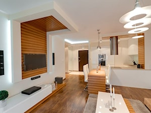 Mieszkanie z nutą Skandynawską - Duży biały salon z kuchnią z jadalnią, styl skandynawski - zdjęcie od ARCHITETTO