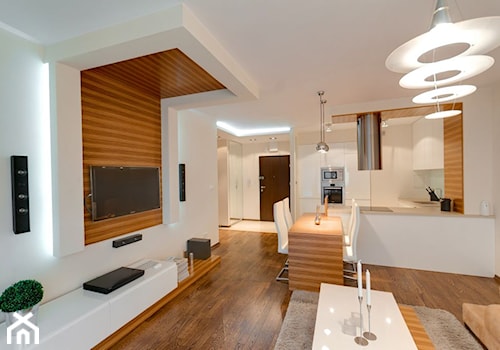 Mieszkanie z nutą Skandynawską - Duży biały salon z kuchnią z jadalnią, styl skandynawski - zdjęcie od ARCHITETTO