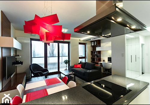 Apartament z nutką czerwieni - Średni szary salon z jadalnią z tarasem / balkonem z bibiloteczką, styl nowoczesny - zdjęcie od ARCHITETTO