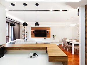 Apartament w orzechu - Średni biały salon z jadalnią z bibiloteczką, styl nowoczesny - zdjęcie od ARCHITETTO