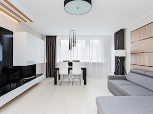 Apartament po dziadku - Duży biały salon z jadalnią, styl minimalistyczny - zdjęcie od ARCHITETTO