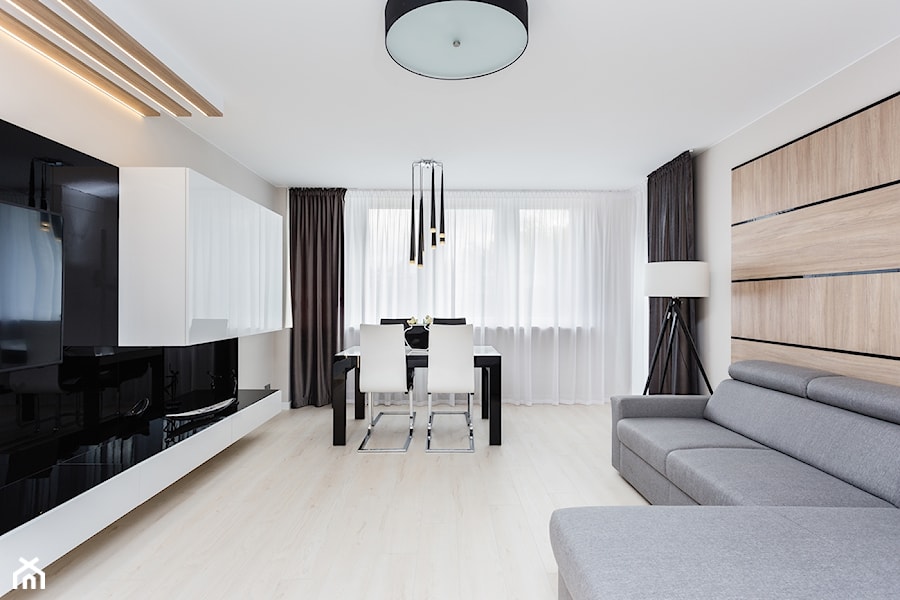 Apartament po dziadku - Duży biały salon z jadalnią, styl minimalistyczny - zdjęcie od ARCHITETTO