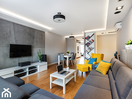 Aranżacje wnętrz - Salon: Apartament z betonem - Średni szary salon z jadalnią z bibiloteczką, styl minimalistyczny - ARCHITETTO. Przeglądaj, dodawaj i zapisuj najlepsze zdjęcia, pomysły i inspiracje designerskie. W bazie mamy już prawie milion fotografii!