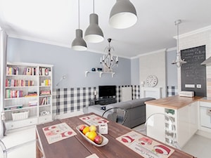 Przytulnie jak w domu - Średnia szara jadalnia w salonie w kuchni, styl skandynawski - zdjęcie od ARCHITETTO