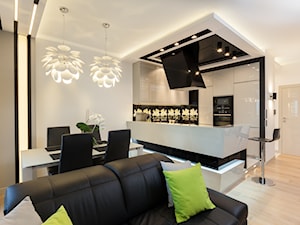 Salon z ukosem - Średni biały salon z kuchnią z jadalnią, styl nowoczesny - zdjęcie od ARCHITETTO