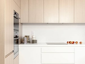 Dom na Mazurach - Otwarta z kamiennym blatem biała z zabudowaną lodówką z kuchenką mikrofalową kuchnia w kształcie litery l z kompozytem na ścianie nad blatem kuchennym, styl nowoczesny - zdjęcie od oikoi
