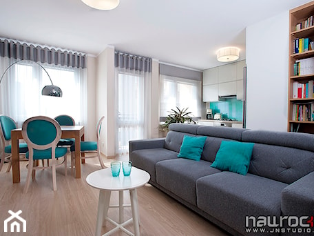 Aranżacje wnętrz - Salon: Apartament w turkusie - Średni salon z kuchnią z jadalnią z bibiloteczką, styl glamour - JN STUDIO JOANNA NAWROCKA. Przeglądaj, dodawaj i zapisuj najlepsze zdjęcia, pomysły i inspiracje designerskie. W bazie mamy już prawie milion fotografii!