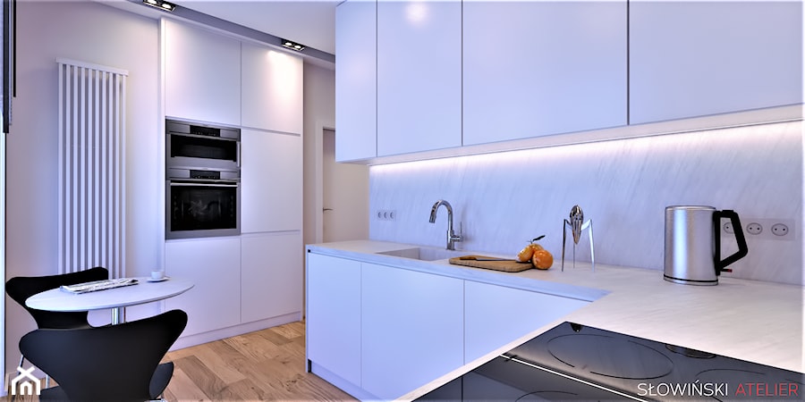Mieszkanie inspirowane BAUHAUS'em - Średnia otwarta biała z zabudowaną lodówką z podblatowym zlewozmywakiem kuchnia w kształcie litery l z kompozytem na ścianie nad blatem kuchennym, styl minimalistyczny - zdjęcie od Atelier Słowiński