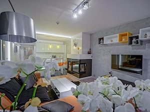 Malutki apartament nowoczesny z żółtym akcentem - Salon, styl nowoczesny - zdjęcie od STUDIO FORMY BIURO ARCHITEKTONICZNE AGNIESZKA BURZYKOWSKA- WALKOSZ