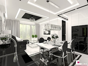 Mieszkanie pokazowe w Konstancinie-Jeziornie - Duża biała czarna jadalnia w salonie w kuchni, styl glamour - zdjęcie od CUBE Interior Design