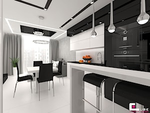Mieszkanie w Mińsku Mazowieckim 50 m2 - Duża otwarta z salonem szara z zabudowaną lodówką kuchnia jednorzędowa, styl nowoczesny - zdjęcie od CUBE Interior Design