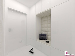 Dom w Markach - Mały z wieszakiem biały hol / przedpokój, styl nowoczesny - zdjęcie od CUBE Interior Design