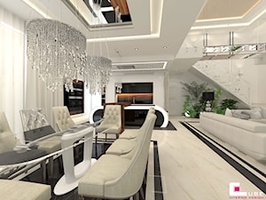 Dom pod Zambrowem - Duża biała jadalnia w salonie jako osobne pomieszczenie, styl nowoczesny - zdjęcie od CUBE Interior Design