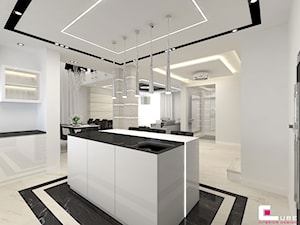 Projekt wnętrz domu - Duża z salonem biała z zabudowaną lodówką kuchnia w kształcie litery u z wyspą lub półwyspem, styl nowoczesny - zdjęcie od CUBE Interior Design