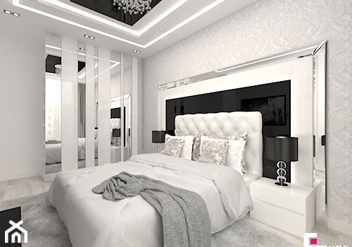 Mieszkanie w Mińsku Mazowieckim 50 m2 - Średnia biała czarna szara z panelami tapicerowanymi sypialnia, styl glamour - zdjęcie od CUBE Interior Design