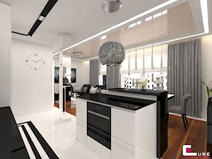 Mieszkanie w Rzeszowie - Średnia otwarta z kamiennym blatem biała z zabudowaną lodówką kuchnia jednorzędowa z wyspą lub półwyspem z oknem, styl glamour - zdjęcie od CUBE Interior Design