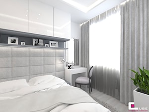 Mieszkanie 70 m2 w Warszawie - Mała biała z panelami tapicerowanymi sypialnia, styl nowoczesny - zdjęcie od CUBE Interior Design