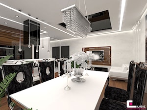 Mieszkanie w Warszawie - Duża biała jadalnia w salonie w kuchni, styl glamour - zdjęcie od CUBE Interior Design