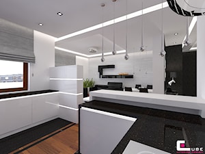 Apartament w Warszawie - Średnia otwarta biała z zabudowaną lodówką kuchnia w kształcie litery g, styl nowoczesny - zdjęcie od CUBE Interior Design