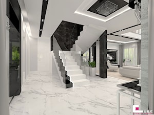 Projekt wnętrz domu w Wołominie - Schody dwubiegowe betonowe, styl glamour - zdjęcie od CUBE Interior Design