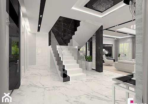 Projekt wnętrz domu w Wołominie - Schody dwubiegowe betonowe, styl glamour - zdjęcie od CUBE Interior Design