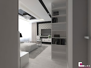 Projekt wnętrz domu - Średnia biała czarna z panelami tapicerowanymi sypialnia, styl nowoczesny - zdjęcie od CUBE Interior Design