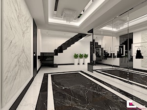 Dom w Chojnowie - Duży biały czarny z marmurem na podłodze hol / przedpokój, styl glamour - zdjęcie od CUBE Interior Design