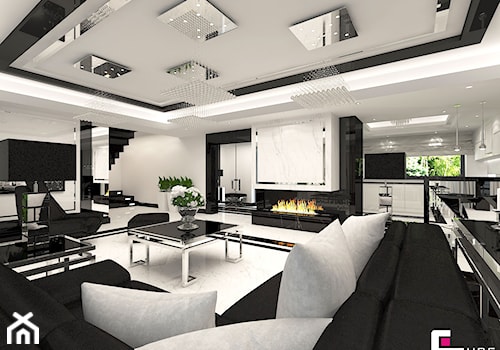 Projekt wnętrz domu w Chojnowie - Duży biały czarny salon z kuchnią z jadalnią, styl glamour - zdjęcie od CUBE Interior Design