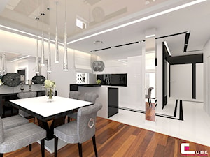 Mieszkanie w Rzeszowie - Średnia otwarta z salonem z kamiennym blatem biała z zabudowaną lodówką kuchnia jednorzędowa z oknem, styl glamour - zdjęcie od CUBE Interior Design