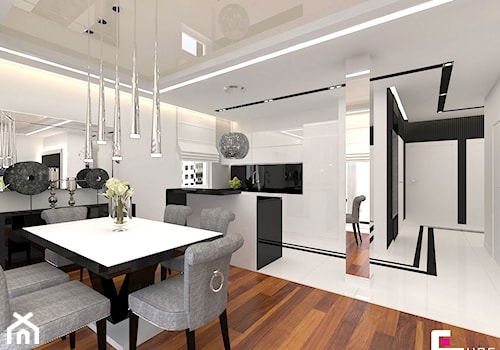 Mieszkanie w Rzeszowie - Średnia otwarta z salonem z kamiennym blatem biała z zabudowaną lodówką kuchnia jednorzędowa z oknem, styl glamour - zdjęcie od CUBE Interior Design