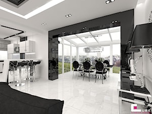 Dom w Elblągu - Duża biała czarna jadalnia jako osobne pomieszczenie, styl glamour - zdjęcie od CUBE Interior Design