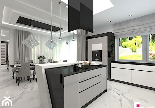 Projekt wnętrz domu w Wołominie - Duża otwarta z kamiennym blatem biała z zabudowaną lodówką kuchnia jednorzędowa z wyspą lub półwyspem z oknem, styl glamour - zdjęcie od CUBE Interior Design