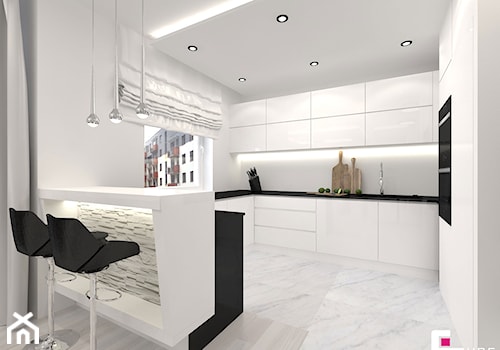 Projekt mieszkania w Siedlcach - Duża otwarta z kamiennym blatem biała z zabudowaną lodówką z podblatowym zlewozmywakiem kuchnia w kształcie litery g z wyspą lub półwyspem z oknem, styl nowoczesny - zdjęcie od CUBE Interior Design