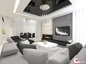 Projekt wnętrz domu - Średni szary salon z jadalnią, styl nowoczesny - zdjęcie od CUBE Interior Design