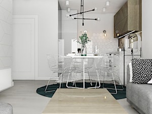Mieszkanie II - Cztery Oceany Gdańsk - Mała biała jadalnia w salonie w kuchni, styl nowoczesny - zdjęcie od Autors.KA