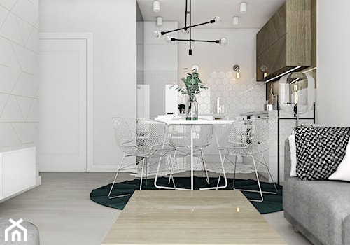 Mieszkanie II - Cztery Oceany Gdańsk - Mała biała jadalnia w salonie w kuchni, styl nowoczesny - zdjęcie od Autors.KA
