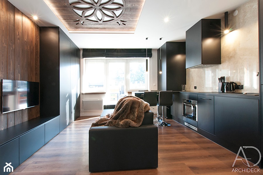 Apartament w Zakopanem w Ciemnych Barwach - Średni czarny salon z kuchnią z jadalnią, styl rustykalny - zdjęcie od LEW ARCHITEKCI