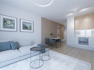 Ciepłe mieszkanie z dużą ilością drewna i niebieskich akcentów - Średnia otwarta z salonem biała z zabudowaną lodówką z podblatowym zlewozmywakiem kuchnia w kształcie litery l, styl minimalistyczny - zdjęcie od LEW ARCHITEKCI