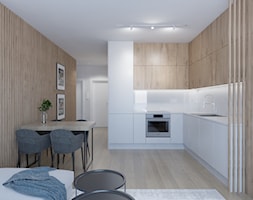 Ciepłe mieszkanie z dużą ilością drewna i niebieskich akcentów - Jadalnia, styl minimalistyczny - zdjęcie od LEW ARCHITEKCI - Homebook