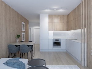 Ciepłe mieszkanie z dużą ilością drewna i niebieskich akcentów - Jadalnia, styl minimalistyczny - zdjęcie od LEW ARCHITEKCI