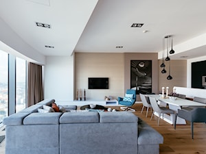 EVOLUXURY- PENTHOUSE Z SAUNĄ - Duży biały salon z kuchnią z jadalnią, styl nowoczesny - zdjęcie od EVOLUXURY DESIGN ARKADIUSZ JASKOLSKI