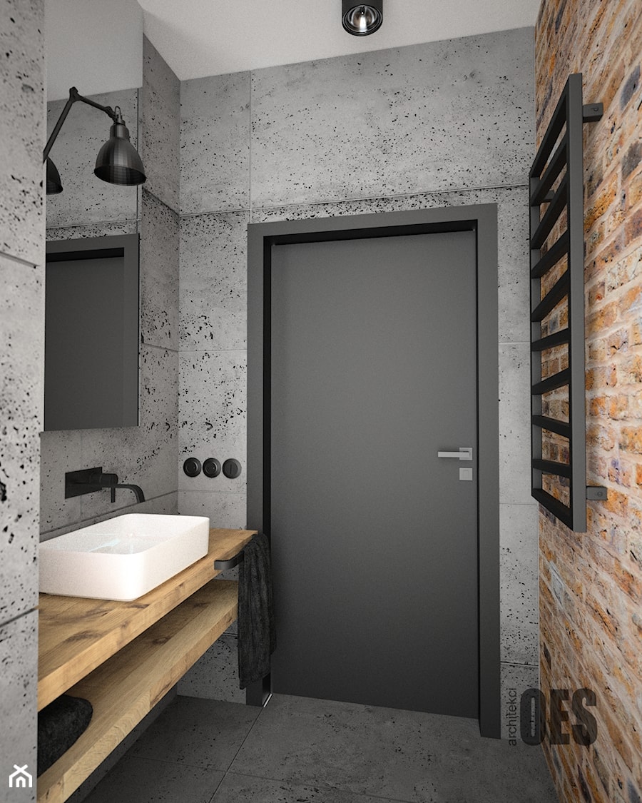Surowa betonowa łazienka - Mała na poddaszu bez okna z lustrem łazienka, styl nowoczesny - zdjęcie od OES architekci