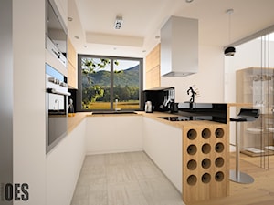 Projekty kuchni - Średnia otwarta biała czarna kuchnia w kształcie litery u z wyspą, styl nowoczesn ... - zdjęcie od OES architekci