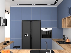 Niebieska kuchnia - Średnia otwarta z salonem biała z zabudowaną lodówką z nablatowym zlewozmywakiem kuchnia w kształcie litery g, styl nowoczesny - zdjęcie od OES architekci