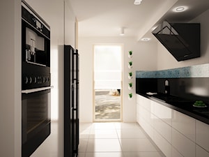 Projekt mieszkania - Średnia zamknięta biała czarna z lodówką wolnostojącą kuchnia dwurzędowa z kompozytem na ścianie nad blatem kuchennym, styl nowoczesny - zdjęcie od InDecor