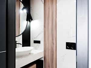 Realizacja projektu mieszkania na wynajem krótkoterminowy Kraków - Mała z lustrem z marmurową podłogą z punktowym oświetleniem łazienka, styl nowoczesny - zdjęcie od All Design Agnieszka Lorenc