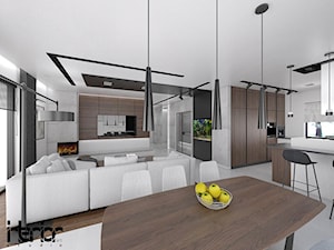 Dom z ciemnym drewnem - Duży brązowy szary salon z kuchnią z jadalnią, styl nowoczesny - zdjęcie od interior art studio