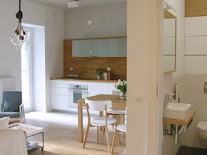 Poloneza 36m2 - Mały biały salon z kuchnią z jadalnią, styl nowoczesny - zdjęcie od ESTU architektura wnętrz
